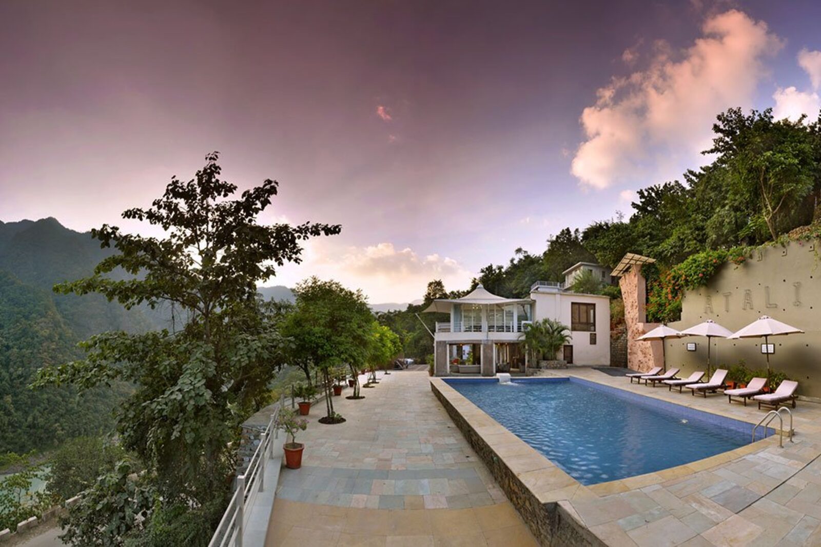 Pool at sunset with mountain views